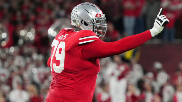 Sat., Jan. 1, 2022; Pasadena, California, USA; Ohio State Buckeyes offensive lineman Dawand Jones (79) celebrates during the fourth quarter of the 108th Rose Bowl Game between the Ohio State Buckeyes and the Utah Utes at the Rose Bowl. Rose Bowl Game Ohio State Buckeyes Against Utah Utes